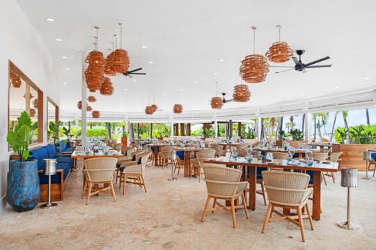 Upscale covered outdoor dining area at a resort restaurant