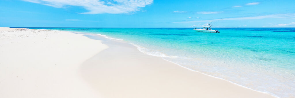 Boat at a beach on an uninhabited cay near Grand Turk.