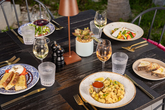 Table with entrée plates at Casa Nonna restaurant