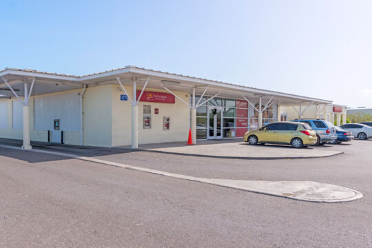 Entrance and parking lot of CIBC Caribbean Bank in Turks and Caicos