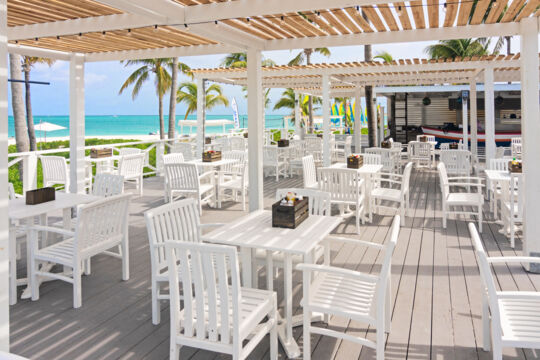 Tables at Sharkies beach bar