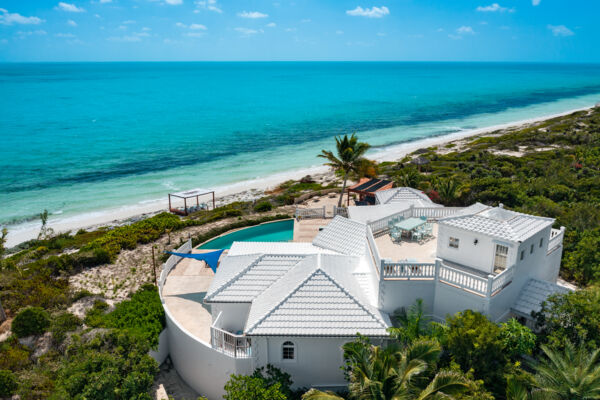 Aerial view of Conched Out Villa and Long Bay Beach