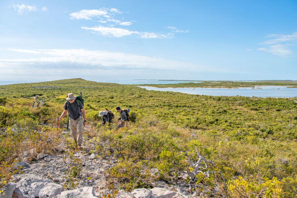 Hikers at Goods Hill, East Caicos.