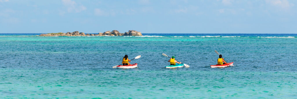 Fish Rock and three kayakers