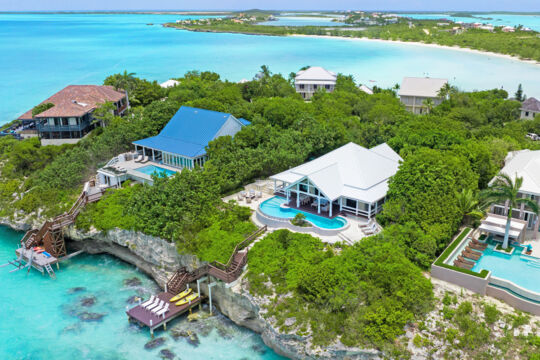 Luxury villas with docks on a lush peninsula in Turks and Caicos