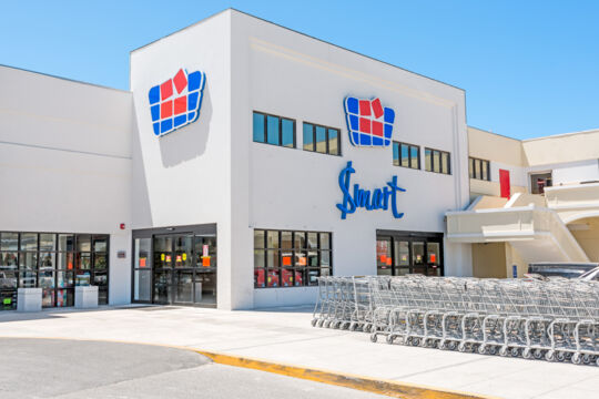 Entrance of the Graceway Smart supermarket and parked shopping carts