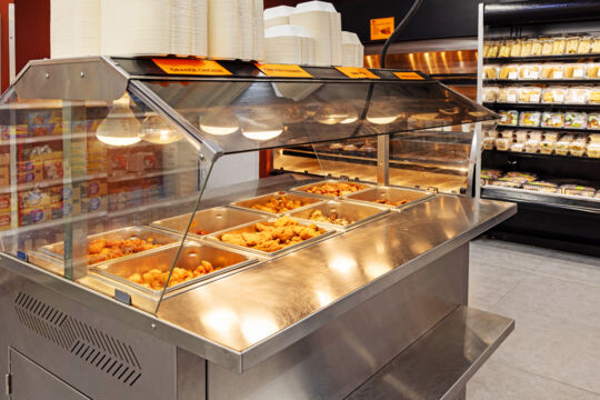 Hot food counter at a Turks and Caicos grocery store.