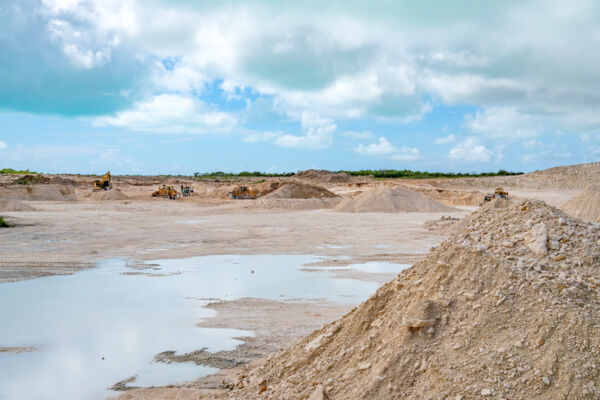 Excavators in a large limestone quarry in Turks and Caicos.