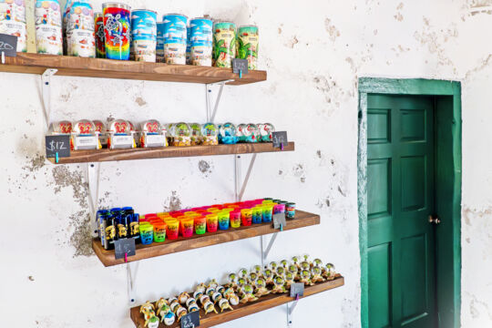Water bottles, snow globes, and other trinkets at the H.M. Prison gift shop. 