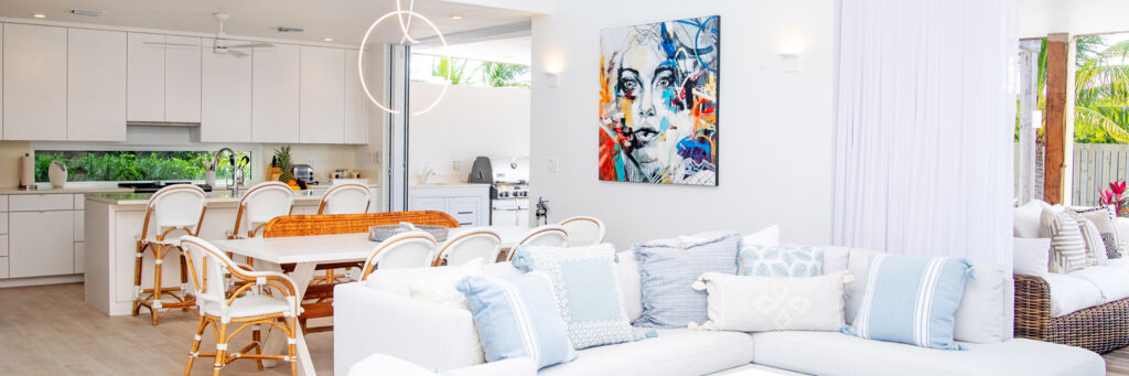 Dining and living room area of a luxury villa in Turks and Caicos. 
