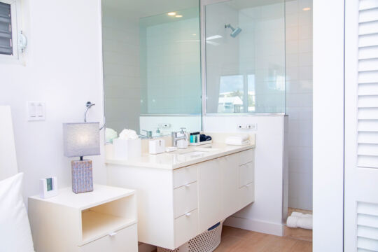 Bathroom with sink and shower in villa bedroom