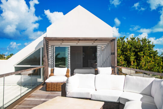 Furnished balcony at a luxury villa.