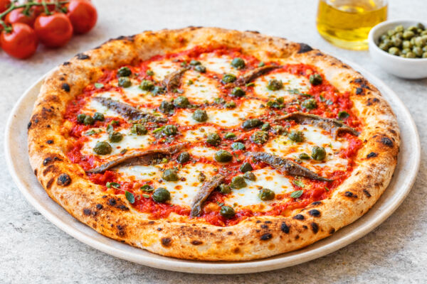 Pizza with capers and anchovies.