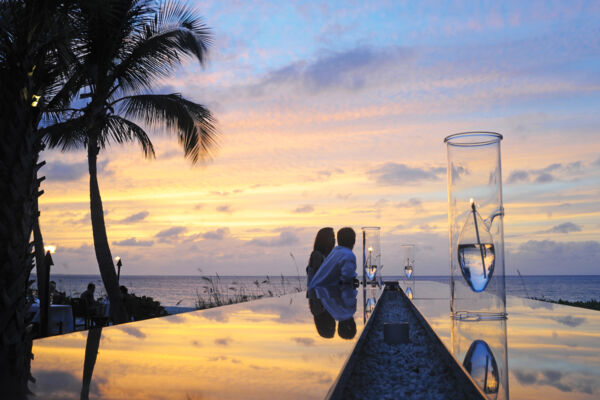 Couple at Infiniti Bar at sunset