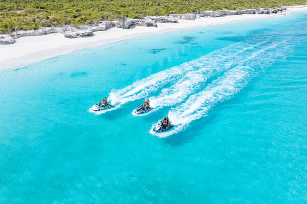 Aerial view of three jet skis at Water Cay.