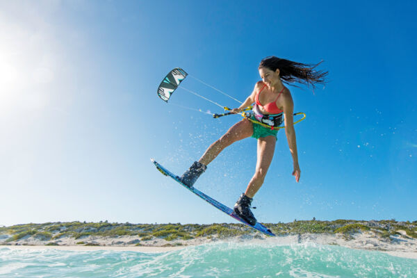 Kiteboarder jumping at Long Bay Beach