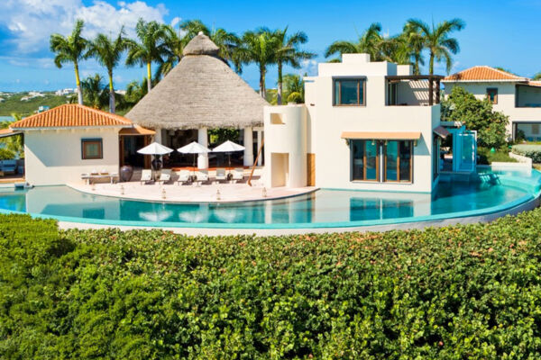 Aerial view of pool and trees at Bajacu Villa in Turks and Caicos