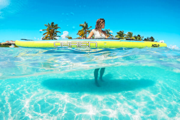 Paddleboarder in clear water in the Turks and Caicos