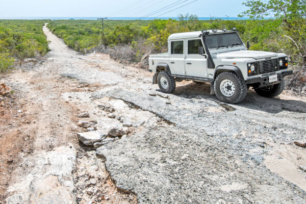 Rough road with Land Rover Defender 110 Double Cab on the route to Malcom's Road Beach