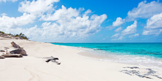 White sand and clear ocean water at North Bay Beach