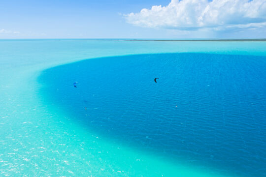 Aerial view of kiteboarders at the Middle Caicos Ocean Hole
