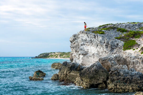 Hiking on the soft limestone coastal cliffs at the Highlands in South Caicos