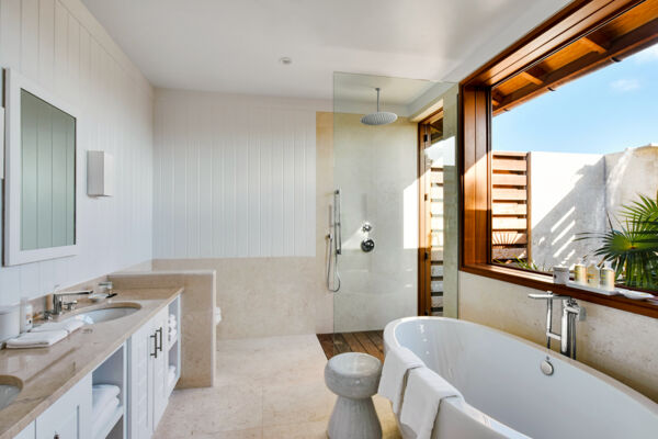 Bathroom and outdoor shower in a luxury villa