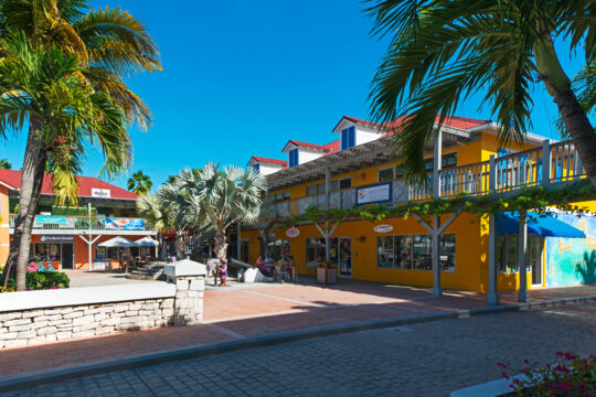 Paved courtyard at brightly colored plaza on Providenciales