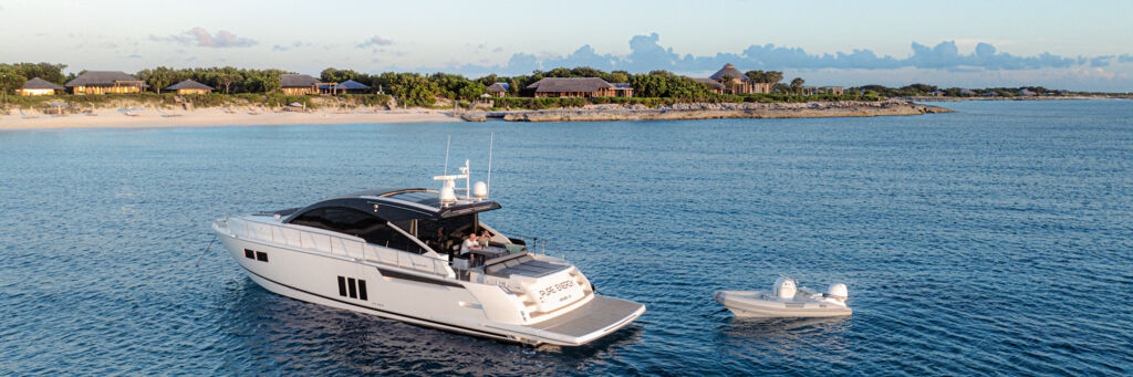 Yacht off Malcolm's Road Beach, Providenciales, at sunset. 