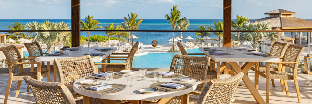 Restaurant terrace overlooking the beach. 