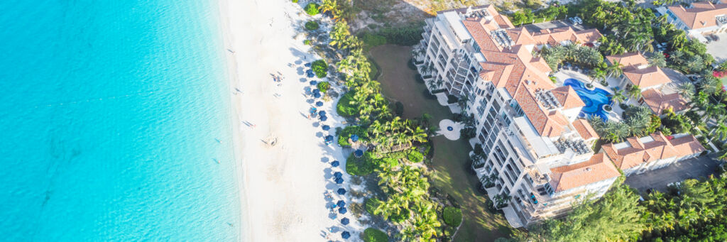 Aerial view of The Regent Grand hotel on Grace Bay Beach