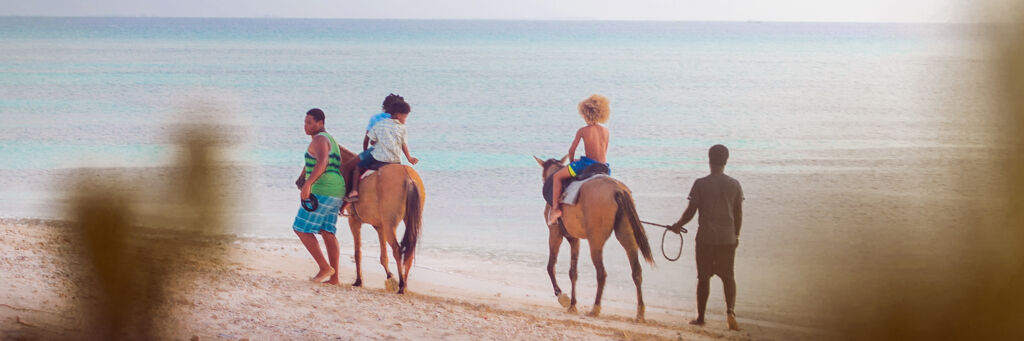 Horseback riding on Pillory Beach on Grand Turk