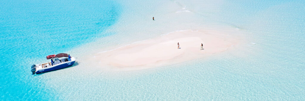 Aerial view of boat at the Fort George Cay sandbars in the Turks and Caicos