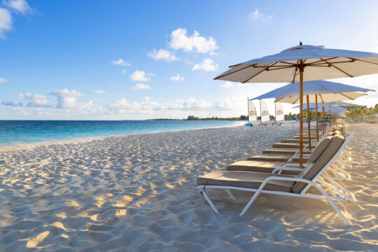 Beach loungers and umbrellas at Seven Stars