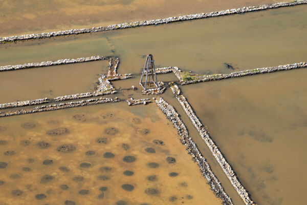 Aerial view of wind pump in the South Caicos salinas