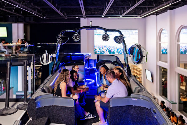 Group of friends enjoying drinks at a sports bar in Turks and Caicos. 