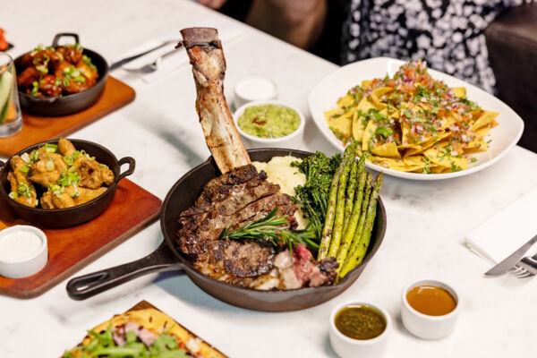 Tomahawk steak with sides. 