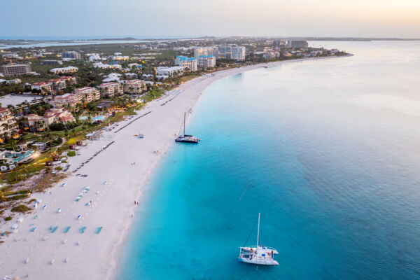 Aerial view of Grace Bay Beach and sailing catamarans