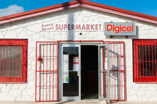 Small supermarket with Digicel sign