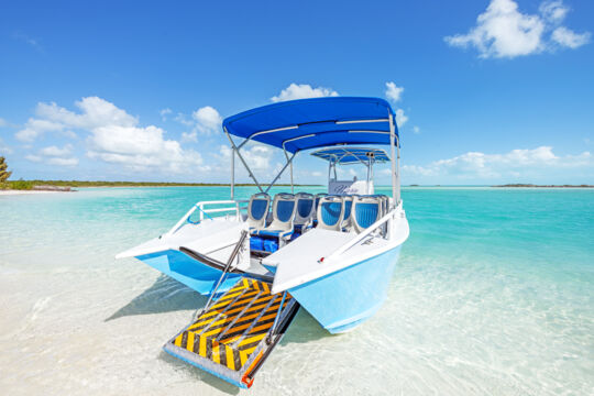 A cruising boat with a safety ramp at a beach in Turks and Caicos. 