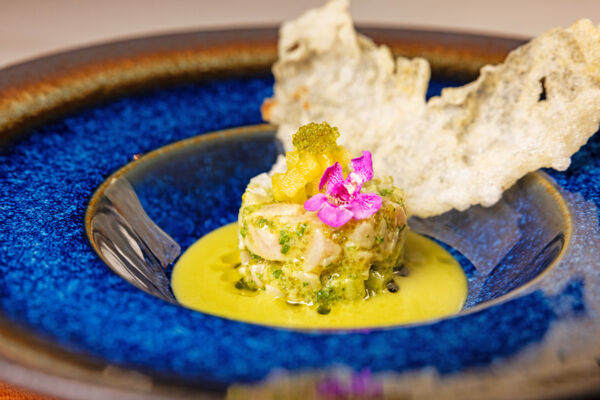 Fine dining dish in blue plate.