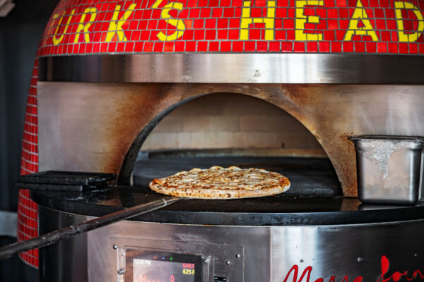 Pizza in a pizza oven.
