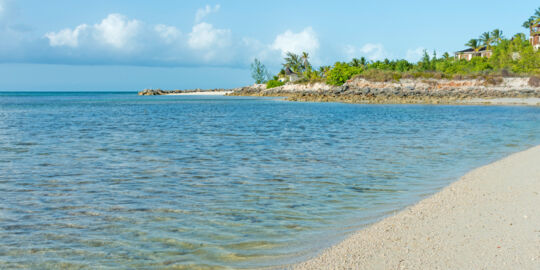 The beach at Thompson Cove and luxury villa