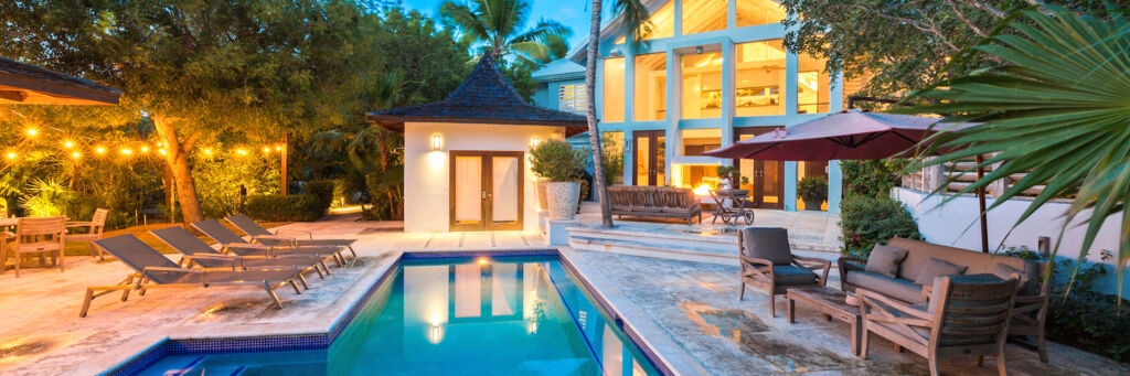 Exterior of Tree House villa at dusk
