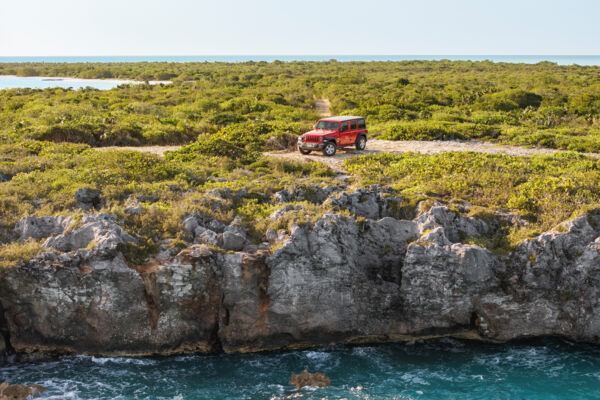 Red Jeep at a cliff in Turks and Caicos.