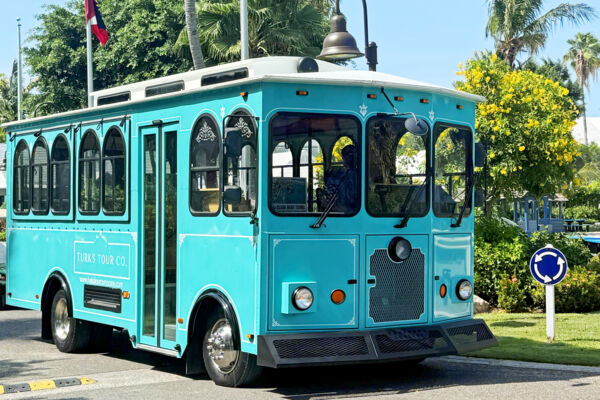 Turquoise trolley bus in Turks and Caicos.
