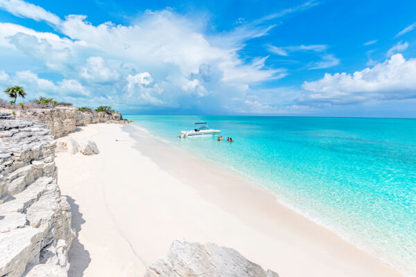 Water Cay beach and boat