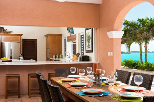 Terrace bar and dining table at Villa Palermo