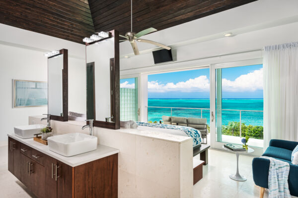 Luxury villa bedroom and ensuite bathroom