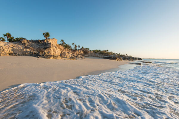 Sunset at the beach and cliffs of Water Cay